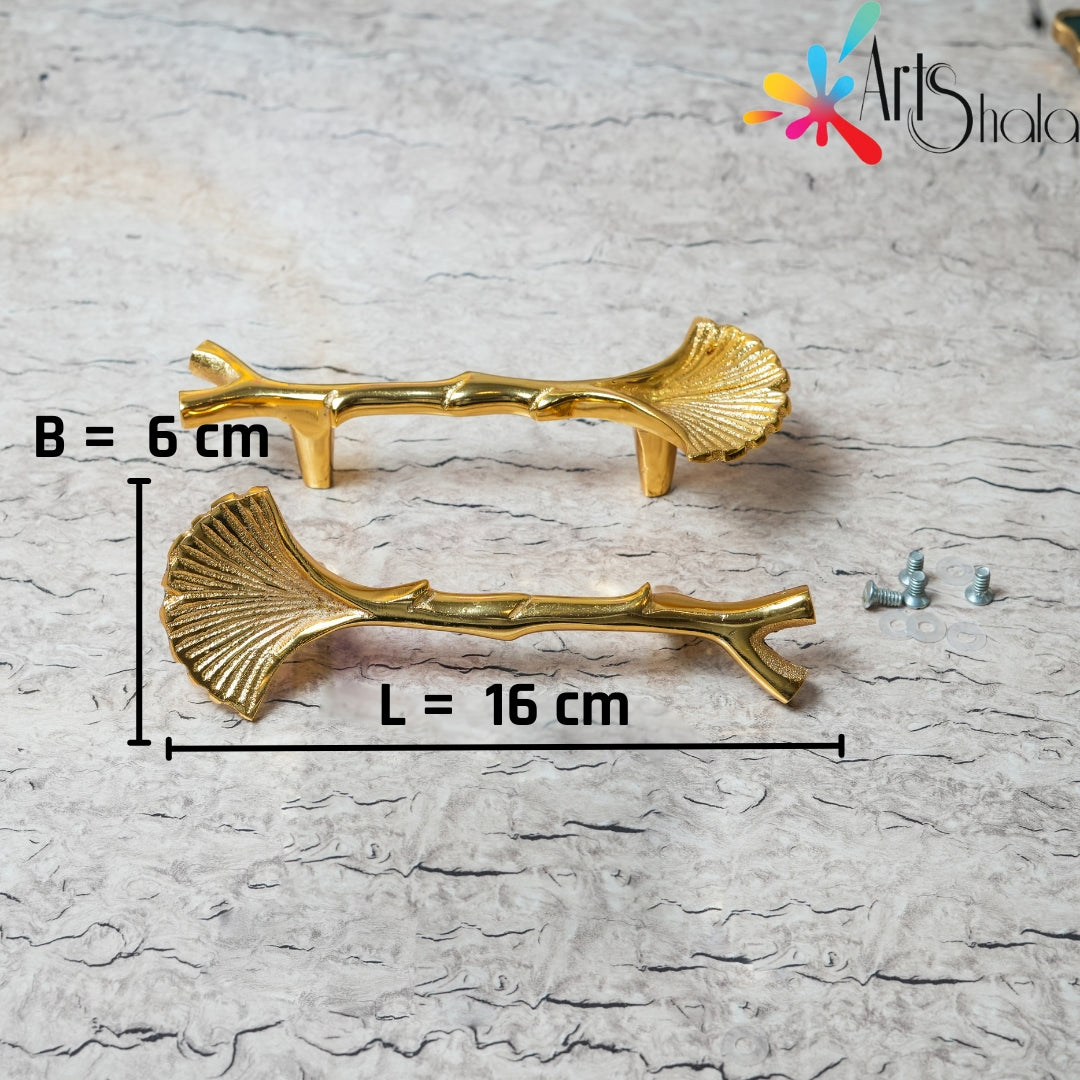 two golden sea shell