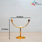 golden metal clock stand